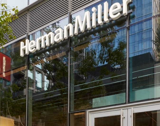  	Exterior view of Herman Miller's corporate office's glass walls.
